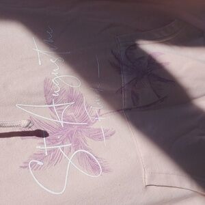 Pink Hoodie with Front Pocket Changes In Sunlight